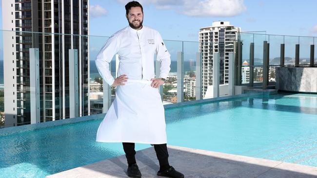 Chef de Cuisine Kelvin Andrews at the infinity pool. Photo by Richard Gosling