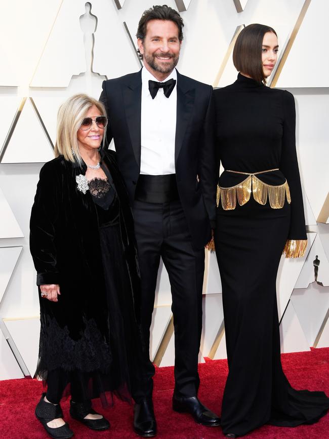 A Star Is Born Oscar nominee Bradley Cooper with his mother, Gloria Campano (left), and girlfriend, Irina Shayk. Picture: Getty Images