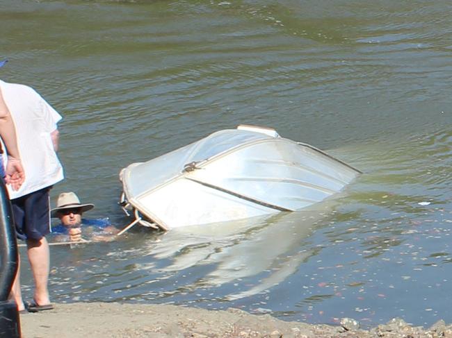 This group of fisherman had that sinking feeling when they attempted to launch their boat near Dundee.