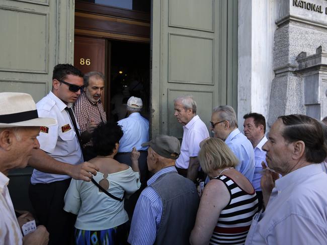 Restrictions ... Greek banks reopen but place many restrictions on transactions, including cash withdrawals. Picture: AP/Thanassis Stavrakis