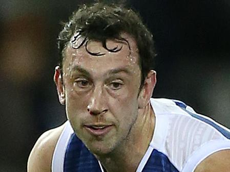 AFL : Round 10 , Carlton V  North Melbourne  at Etihad Stadium, 28th May , Melbourne Australia.  North Melbourne's Todd Goldstein steps inside Carlton's Zac FischerPicture : George Salpigtidis