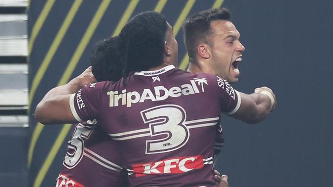 LAS VEGAS, NEVADA - MARCH 02: LukeÂ Brooks of the Sea Eagles celebrates with his team mates after scoring a try during the round one NRL match between Manly Sea Eagles and South Sydney Rabbitohs at Allegiant Stadium, on March 02, 2024, in Las Vegas, Nevada. (Photo by Ezra Shaw/Getty Images)