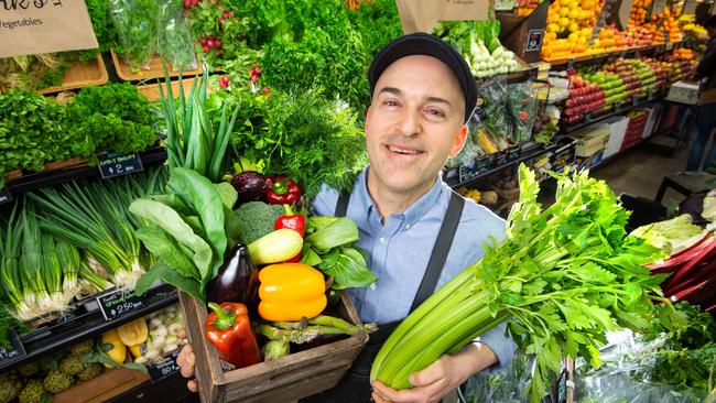 CJoe Anile, from Frank's Quality Friuit &amp; Vegetables at the South Melbourne Market, shows off a bundle of low carb choices as recommended by the CSRIO cookbook. Picture: Jay Town