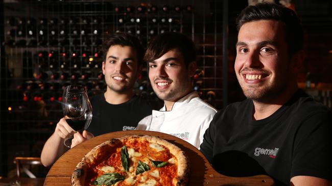 Gemelli owners Paul Carney (right) and his twin brothers, chefs James(black shirt) and Alec Carney (white) are set to open a new bar and restaurant called Gemellini at Nobby Beach. Picture: Glenn Hampson.