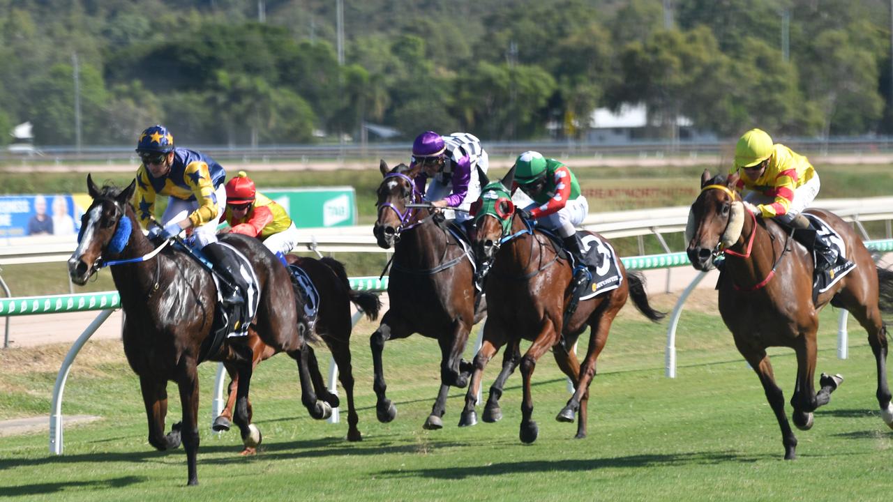 Finish of Race 2 at Cluden. Ryan Wiggins on Divine Wit (left) win Klein Tools Maiden Plate. Picture: Evan Morgan