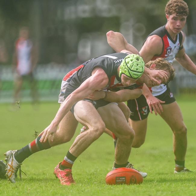 Ben Morison uses his body and has eyes for the ball. Photos by Stephen Archer