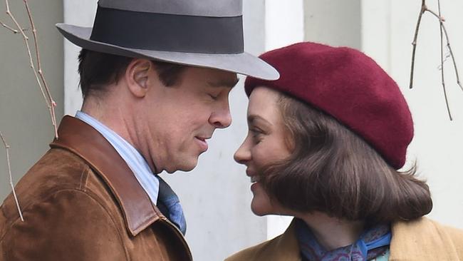 Brad Pitt and Angelina Jolie to divorce after 12 years together amid shock claims he cheated with co-star Marion Cotillard, pictured together on the recent film set in london. The Hollywood actress wants overall physical custody of their six children - not joint custody with Brad after citing irreconcilably differences in legal papers. The New York Post have claimed the 41-year-old actress hired a private investigator to spy on him on the set of his latest film — where they claim she learned he was cheating. Pictured: Brad Pitt, Marion Cotillard Ref: SPL1359035 200916 Picture by: Neil Warner / Splash News Splash News and Pictures Los Angeles: 310-821-2666 New York: 212-619-2666 London: 870-934-2666 photodesk@splashnews.com