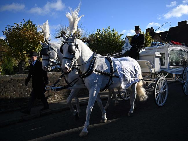 The horse-drawn carriage carrying the coffin of the late One Direction singer Liam Payne. Picture: AFP