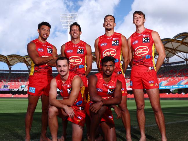 Territory Suns Joel Jeffrey, Will Rowlands, Malcolm Rosas, Lloyd Johnston, Sandy Brock and Ben Long in the Gold Coast Suns' Darwin specific jersey for their 2024 games in the Top End. Picture: Chris Hyde/Getty Images