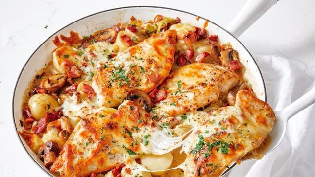 One pan cheese and bacon smothered chicken. 15 delicious dinner recipes featuring chicken breast.