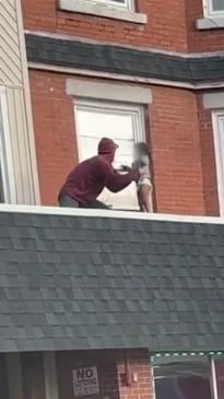 Man leaps into action after seeing toddler on roof