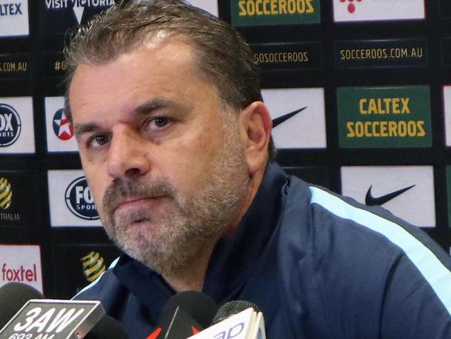 Socceroos coach Ange Postecoglou speaks to the media in Melbourne, Wednesday, September 6, 2017. Australia dominated their final group stage qualifier with Thailand in Melbourne but recorded just a 2-1 win, allowing Saudi Arabia to snatch a direct place on offer at the 2018 World Cup. The Socceroos must now triumph in two home-and-away playoffs - beginning with Syria next month - if they are to play at Russia next year. (AAP Image/Alex Murray) NO ARCHIVING