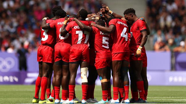 Players of Team Kenya huddle prior to the Men's Rugby Sevens Pool B game. Photo: Getty Images.