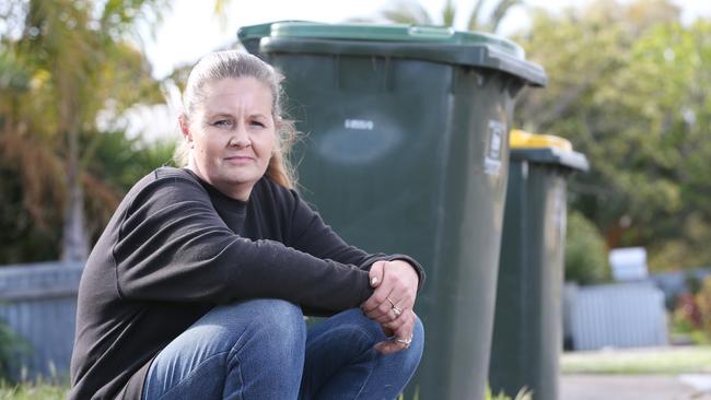 Jenny Clark of Port Noarlunga South with her green waste bin. Picture: Stephen Laffer