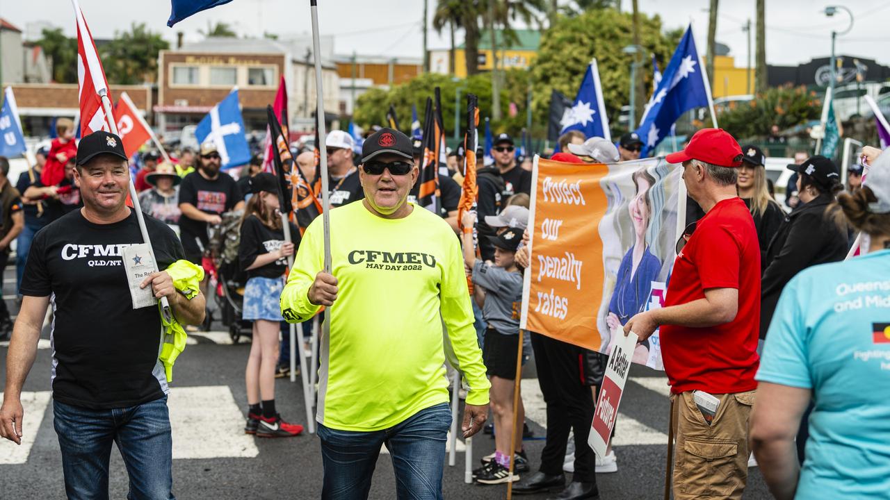 Andrew Burke (left) and Brad Sorensen prepare for the Labour Day 2022 Toowoomba march, Saturday, April 30, 2022. Picture: Kevin Farmer