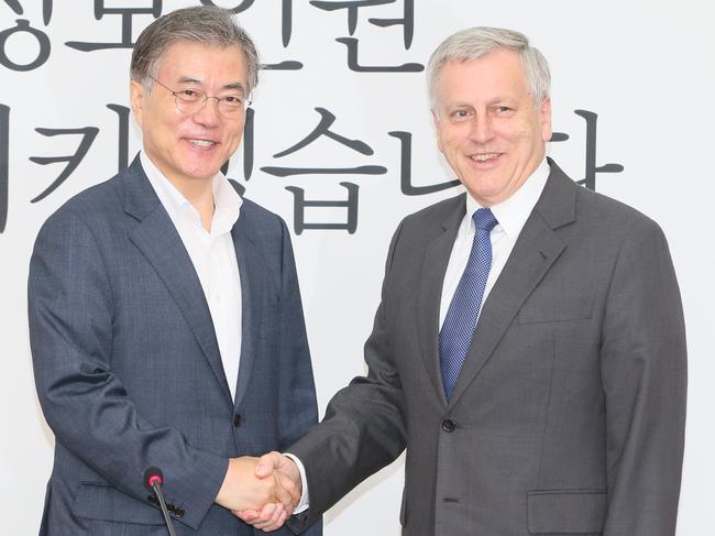 Moon Jae-in, left, with then ambassador Bill Paterson in Seoul in 2015. Picture: AAP