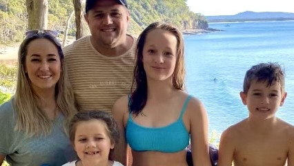 The Greig family (left – right): Jessica Greig, Alex Greig, Giselle Greig, Jett Greig, Oceana Grieg (underneath Alex).