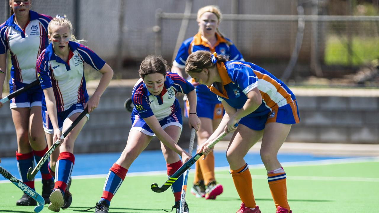 Zahli Carroll (centre) defends for Rangeville against Newtown in J2 girls grand final hockey at Clyde Park, Saturday, September 10, 2022. Picture: Kevin Farmer