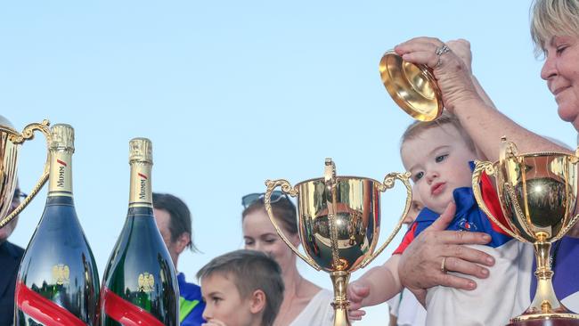 Trainer Gary Clarkes grandaughter Zara and wife Sharlene as “Playoffs” scores an emotional win in the Great Northern Darwin Cup. Picture: Glenn Campbell