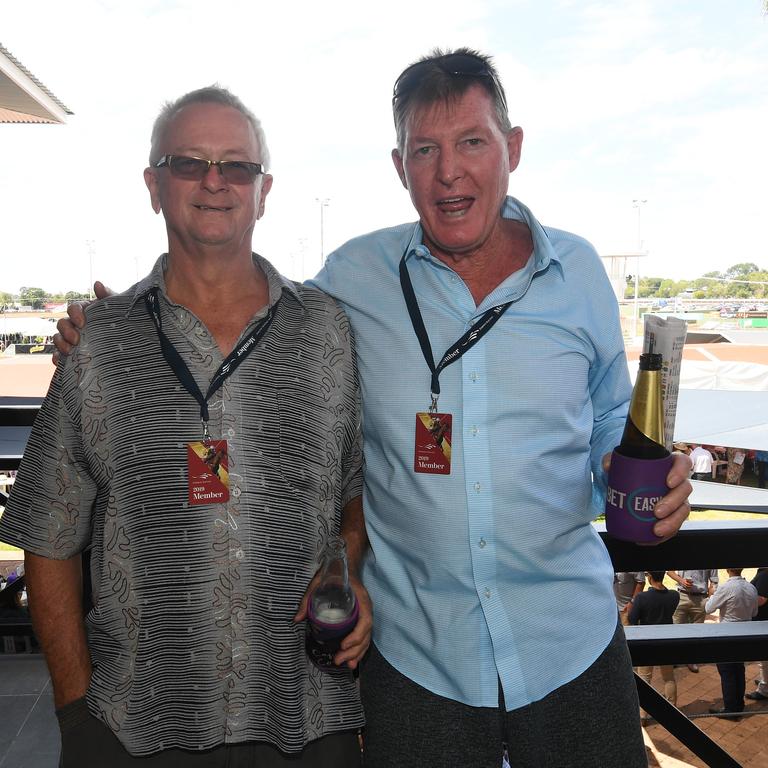 Darwin Cup colour gallery Tommy Sandrey and Gary Smart enjoy the 2019 Darwin Cup. Picture: KATRINA BRIDGEFORD