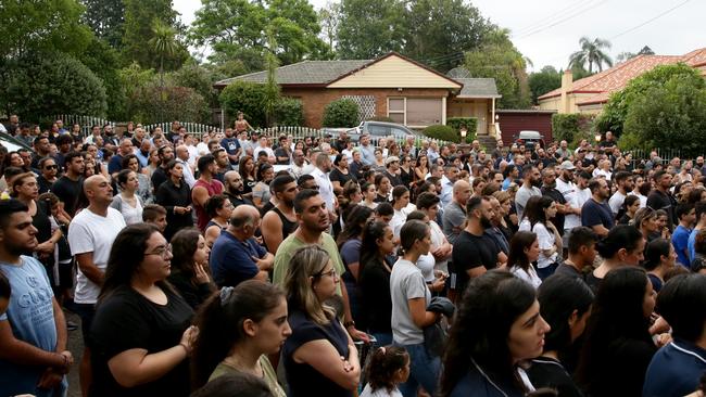 The mourners sang Christian hymns and recited prayers. Picture: Jonathan Ng