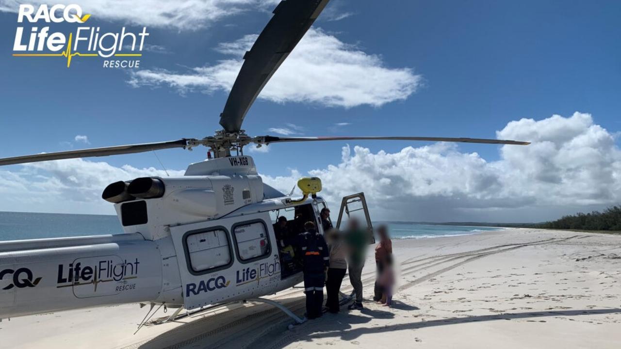 A woman in her 40s was airlifted from the Fraser Coast island of K'gari after breaking her arm while swimming. Image credit: RACQ LifeFlight.