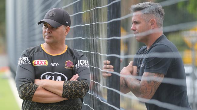 Coach Anthony Seibold talks with Broncos legend Corey Parker at Brisbane training on Tuesday Picture: Peter Wallis