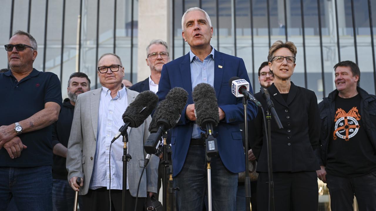 TWU national secretary Michael Kaine fronting a press conference alongside Qantas workers and other union representatives calling for a shake-up of the Qantas board. Picture: NCA NewsWire / Martin Ollman