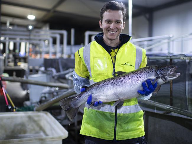 COOL OPERATOR: Austin Lakey with a prize Petuna salmon.