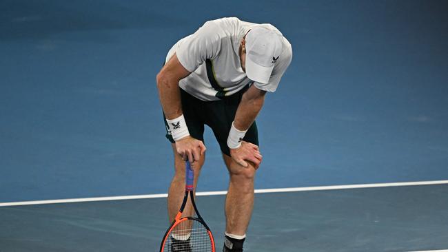 Andy Murray on his haunches after a point.