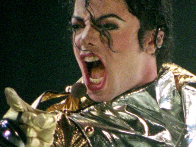 AUCKLAND, NEW ZEALAND - NOVEMBER 10: Michael Jackson performs on stage during is "HIStory" world tour concert at Ericsson Stadium November 10, 1996 in Auckland, New Zealand. (Photo by Phil Walter/Getty Images)