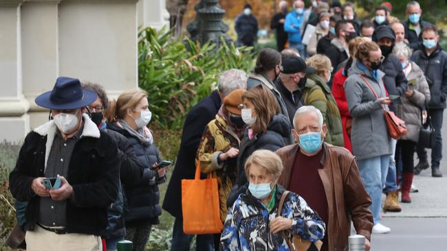 The line at the Royal Exhibition Building on Friday. Picture: David Crosling