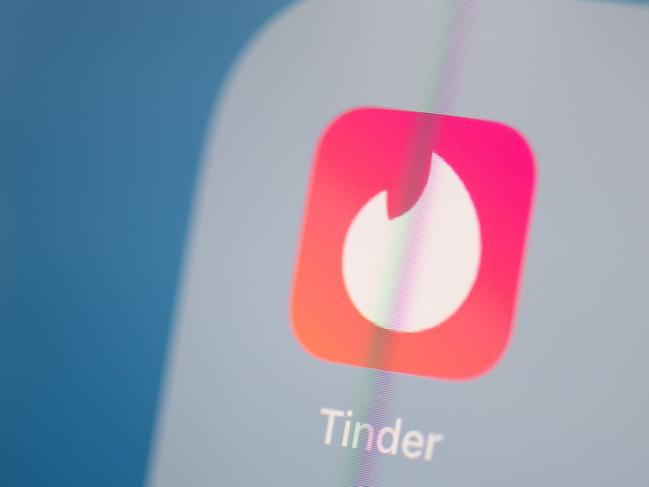 Dating experts recommend avoiding paid versions of apps such as Tinder. Picture: AFP