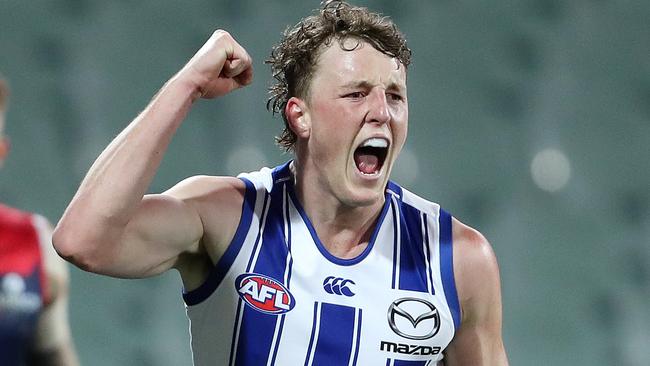 North Melbourne's Nick Larkey celebrates his goal on the quarter time siren. Picture: Sarah Reed