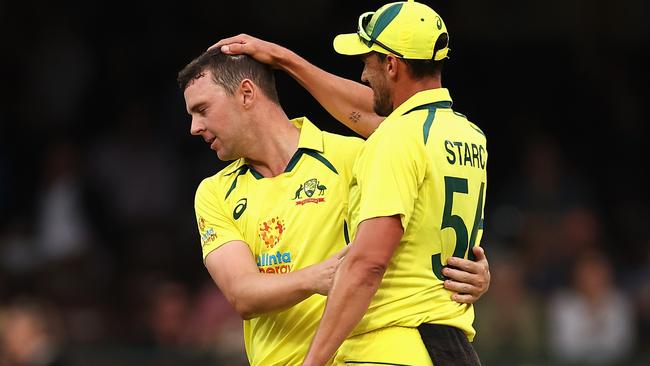 Josh Hazlewood celebrates a wicket with Mitch Starc. Picture: Getty Images