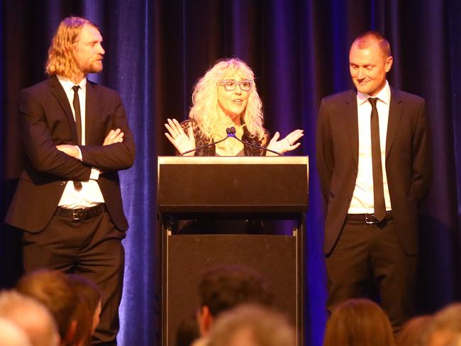 Michael Turner's wife Karen and sons Che and Levi at the memorial service. Picture: Alison Wynd