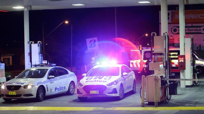 Suffering gunshot wounds, the men drove to this petrol station nearby. Picture: Bill Hearne