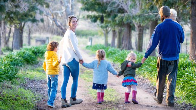 Virginia Tapscott, pictured with her husband Rhys and their four children, feels she is undervalued for the work she puts in as a stay-at-home mother. Picture: Simon Dallinger