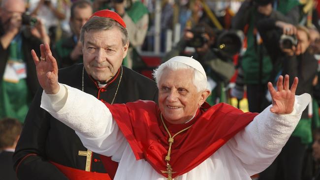 Pope Benedict XVI greets World Youth Day pilgrims in Sydney July 17, 2008. Behind him is Cardinal George Pell, then archbishop of Sydney. Picture: CNS/Paul Haring