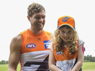 GWS Giants player Sam Reid with Lucy Poile from Cherrybrook. Both have type-1 diabetes. Picture: Ryan Miller/GWS Giants