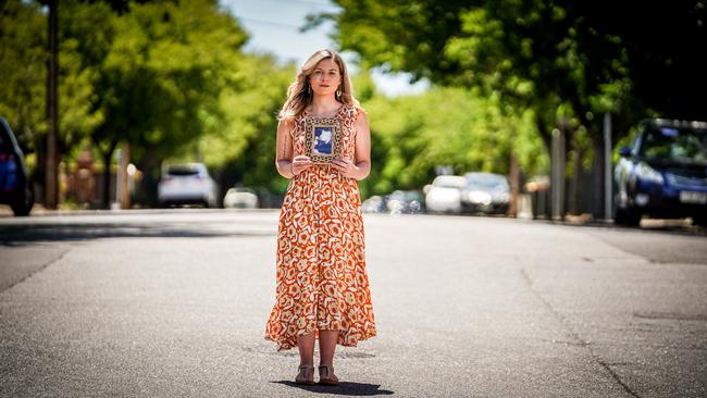 Lauren Ralph with a picture of Abigail. Picture: Mike Burton