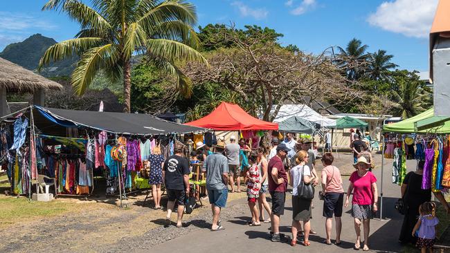 The Punanga Nui Market with its lively food and craft stalls is considered the place to be. Picture: iStock.