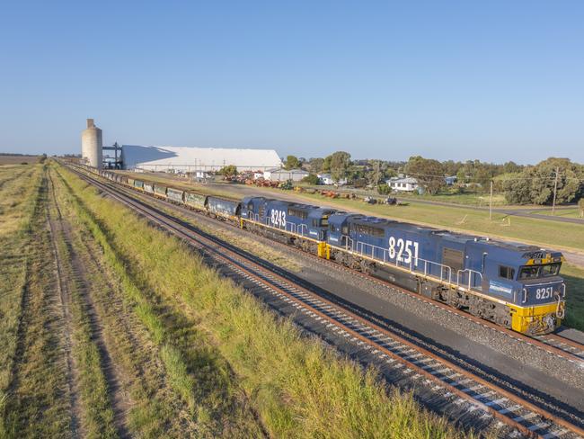 An aerial view of a  Pacific National train carrying canola at Croppa Creek in far north New South Wales. Picture: Inland Rail