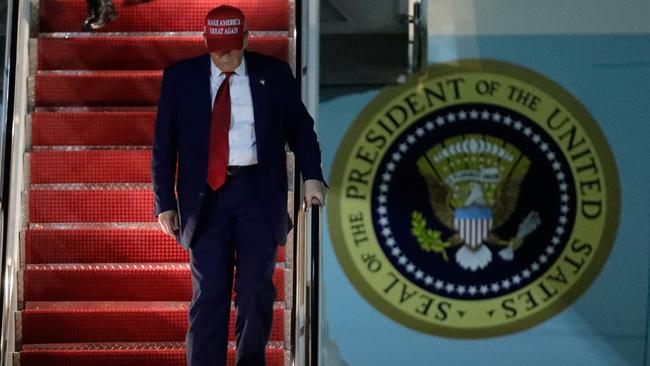 Trump walks down the stairs of Air Force One on Tuesday. Picture: AP /Luis M. Alvarez