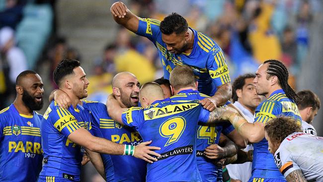 The Eels celebrate a try on Friday night.