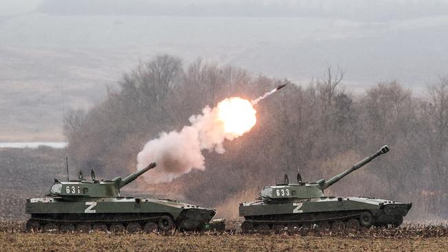 Infantry fighting vehicles are pictured in the village of Bugas, with the symbol displayed. Picture: Sergei Bobylev/TASS via ZUMA Press/Australscope