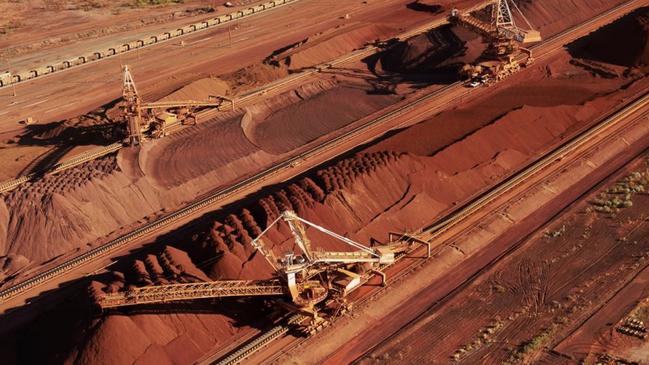 Iron ore being stockpiled for export at Port Hedland in Western Australia. Picture: BHP