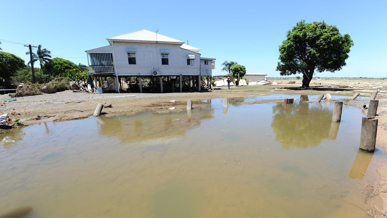 Damage caused by floods in Bundaberg, Saturday, Feb. 2, 2013. Residents of the hardest hit suburb in Queensland's flood crisis have begun the heartbreaking journey of returning home to assess damage after police opened the Burnett Bridge to north Bundaberg residents at 6am. (AAP Image/Paul Beutel) NO ARCHIVING