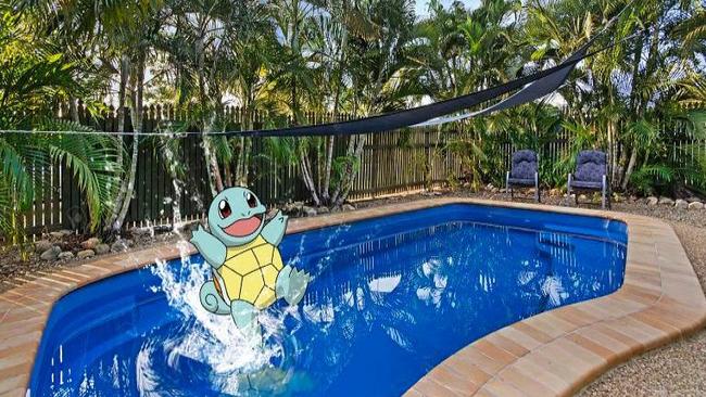 Townville agent Rob Levy is embracing Pokemania. Picture: Realestate.com.au