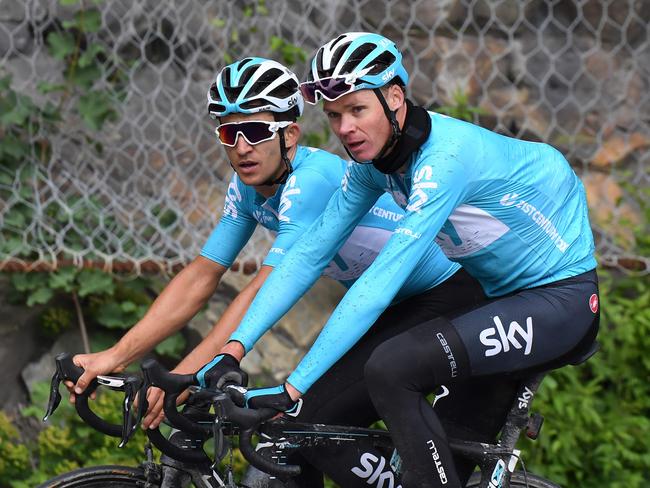 Cyclists of Great Britain's SKY cycling team: Great Britain's Christopher Froome (R) and Poland's Michal Kwiatkowski ride during a track reconnaissance on the road towards the summit of the Alpe d'Huez.